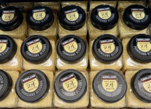 Kirkland 24 Month Aged Parmigiano Reggiano Containers In A Fridge At A Costco