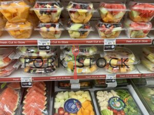 Fresh Fruit Containers At A Grocery Store Refrigerator
