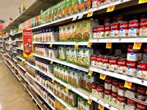 Soup And Broth Cans And Containers At A Grocery Store