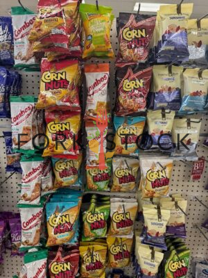 A Variety Of Nut Snacks On Retail Hooks At A Discount Store