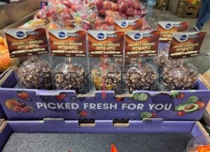 Caramel And Chocolate Dipped Apple With Hershey's And Reese's Chips