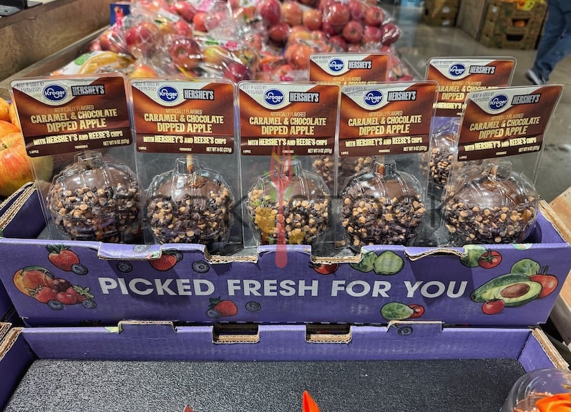 Caramel And Chocolate Dipped Apple With Hershey's And Reese's Chips