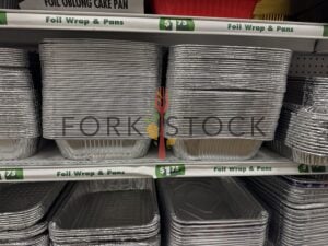 Silver Foil Disposable Containers On Shelving At A Discount Store