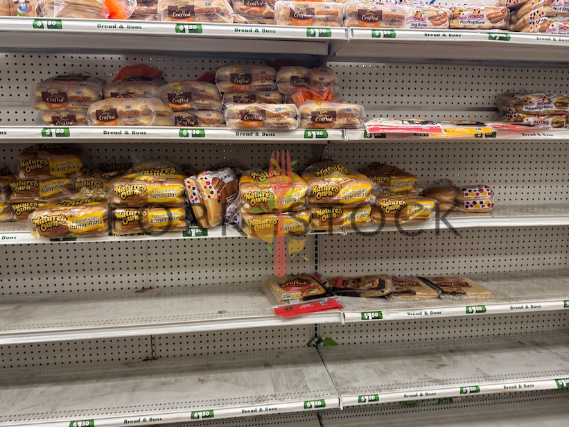 Unstocked Bread And Buns On Shelves At A Discount Store