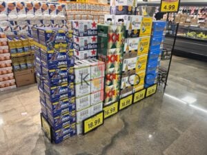 Various Alcoholic Drink Boxes Stacked In a Grocery Store