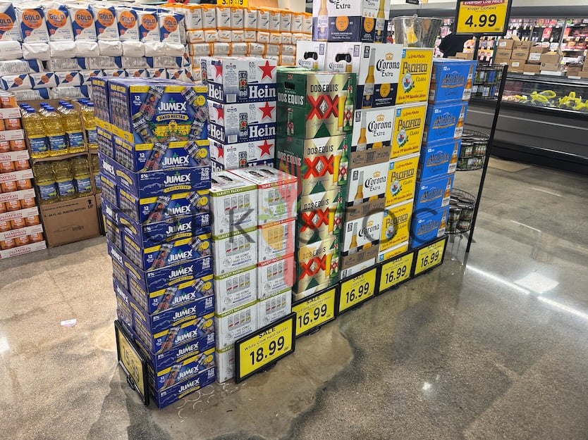 Various Alcoholic Drink Boxes Stacked In a Grocery Store