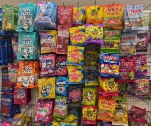 Different Candy Types On Retails Hooks At A Discount Store