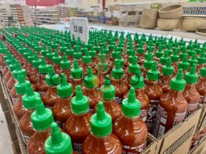 Bottles Of Huy Fong Sriracha Hot Sauce At A Vietnamese Market