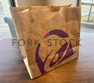 Taco Bell Paper To Go Bag On A Table