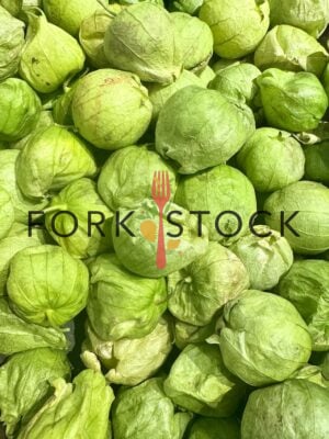 Tomatillos In A Bin At A Grocery Store