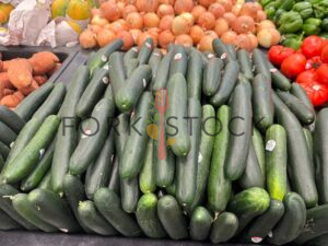 Whole Cucumbers In A Walmart Grocery Store Produce Area